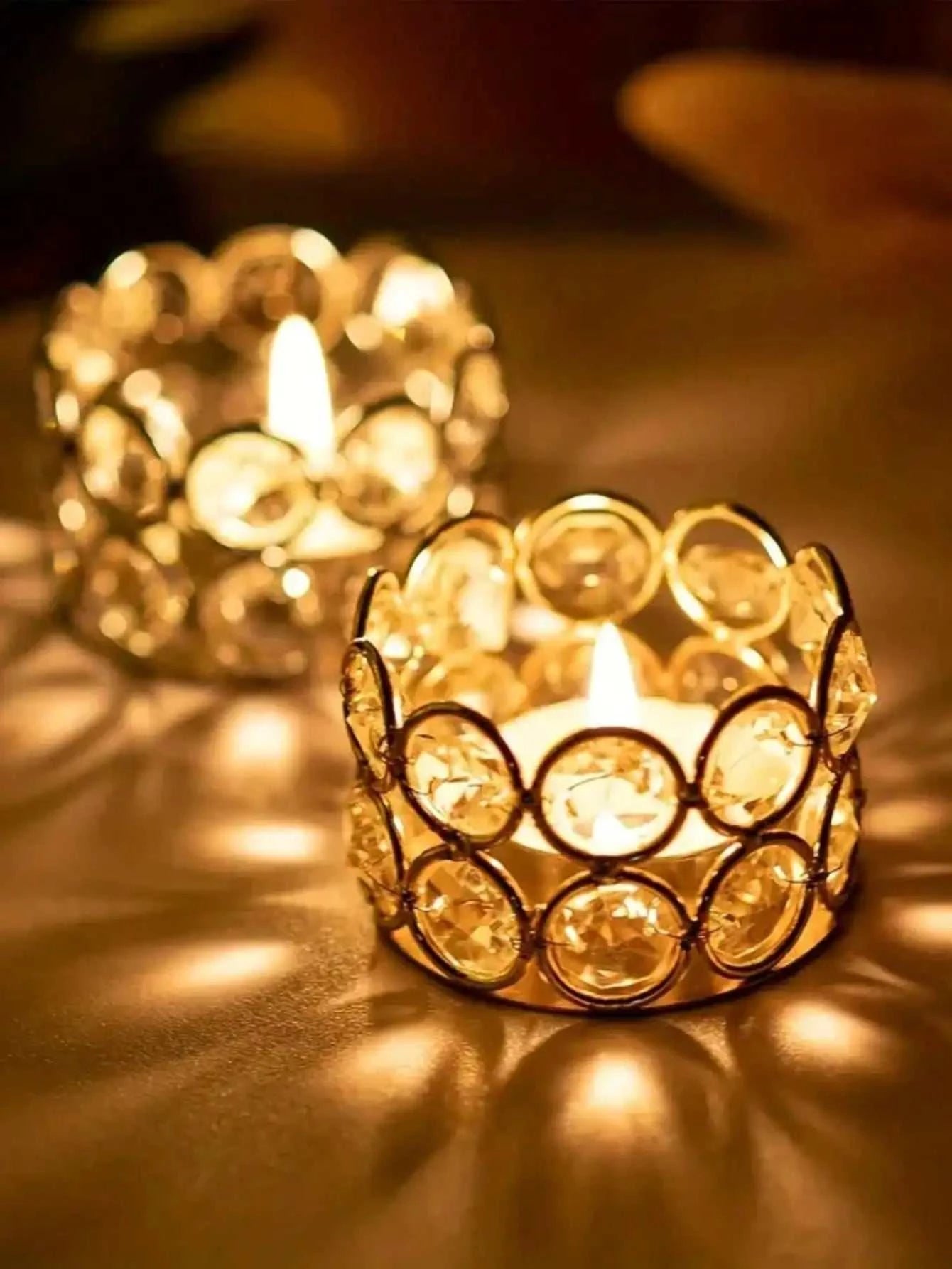 Silver gold crystal tea candle holders with lit candles for wedding decoration